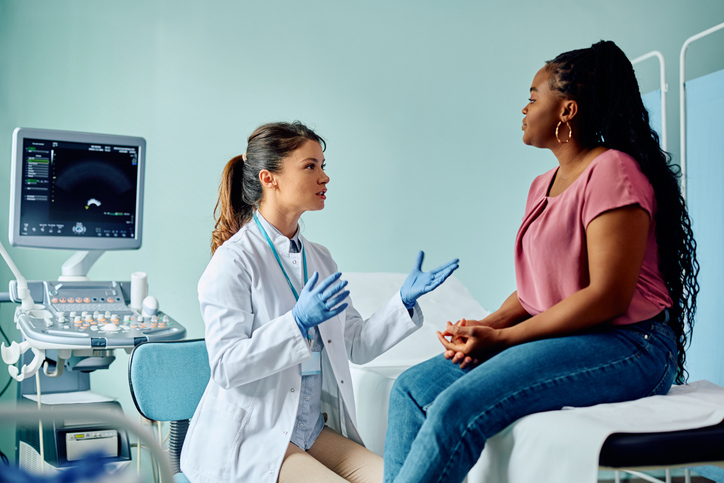 Patient with newly diagnosed glioblastoma consulting her doctor about the STAR-GBM brain cancer clinical trial